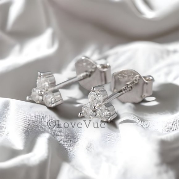 0.20ct. t.w. Diamond Tri-stone Brilliant Cut Stud Earrings - Picture 5 of 16